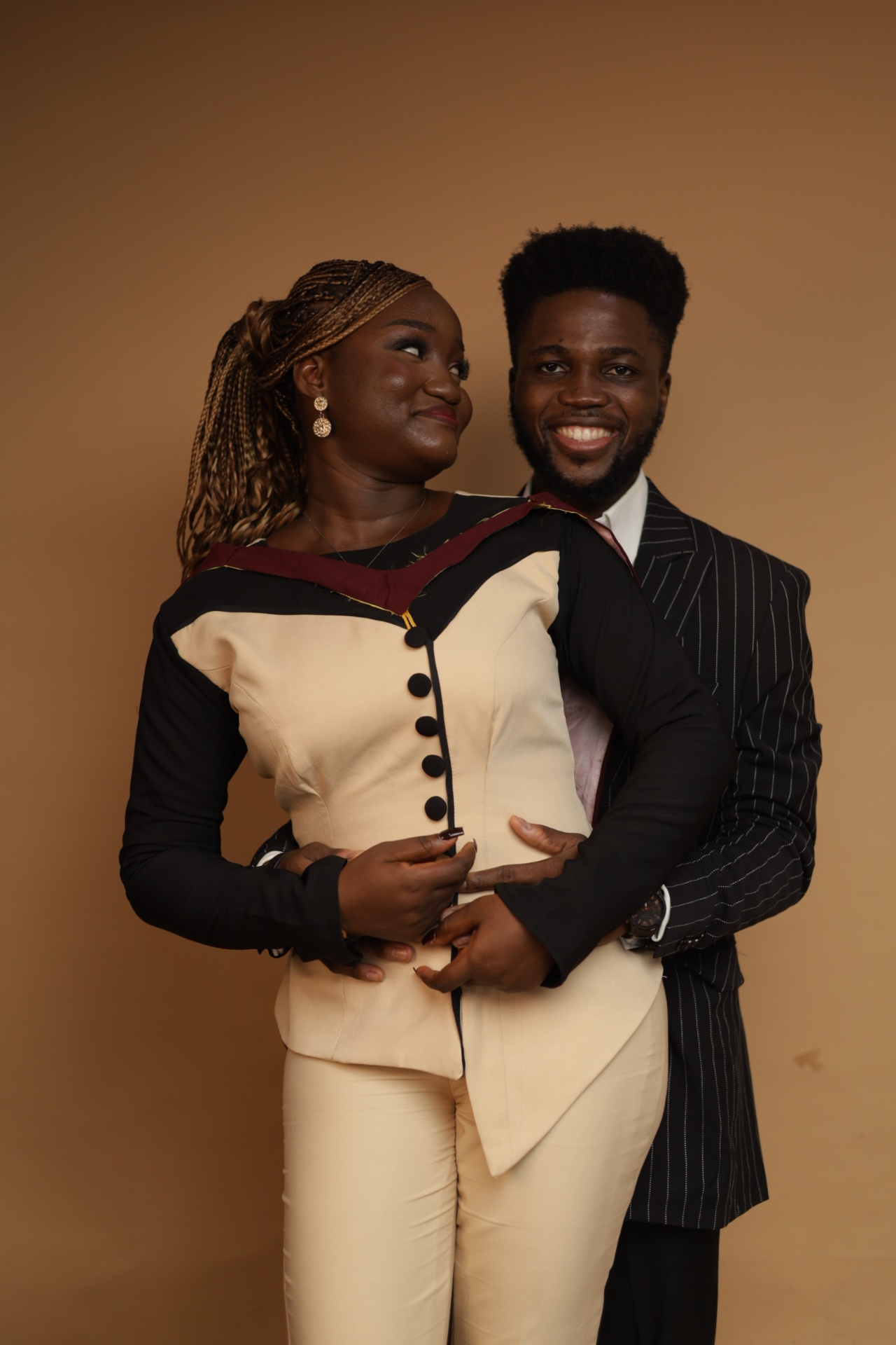 Studio portrait of Kofo and Fiye smiling